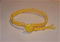 barnarmband gul nylonflätat med nyckelpiga gul.jpg